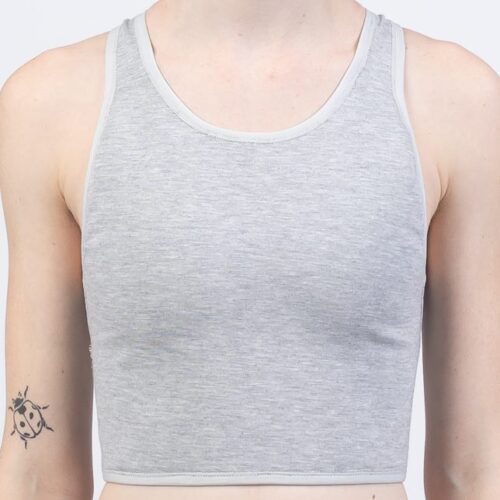 Chest compression – compresión torácica, Breast binding – compresión mamaria, Chest binding – compresión del pecho, Chest bandaging – vendaje del pecho, Breast reduction – reducción mamaria, Chest binding – compresión del pecho, Breast binding – compresión mamaria, Chest compression – compresión torácica, Breast flattening – aplanamiento del pecho, Chest bandaging – vendaje del pecho, Chest binder – binder de pecho, Trans binder – binder trans, FTM binder – binder FtM, Compression top – top de compresión, Chest binder – binder de pecho, Chest compressor – compresor de pecho, Binder trans – binder trans, Binder bra – sujetador compresor, Chest binder FTM – binder FtM, Compression top transgender binder – top compresor para personas transgénero