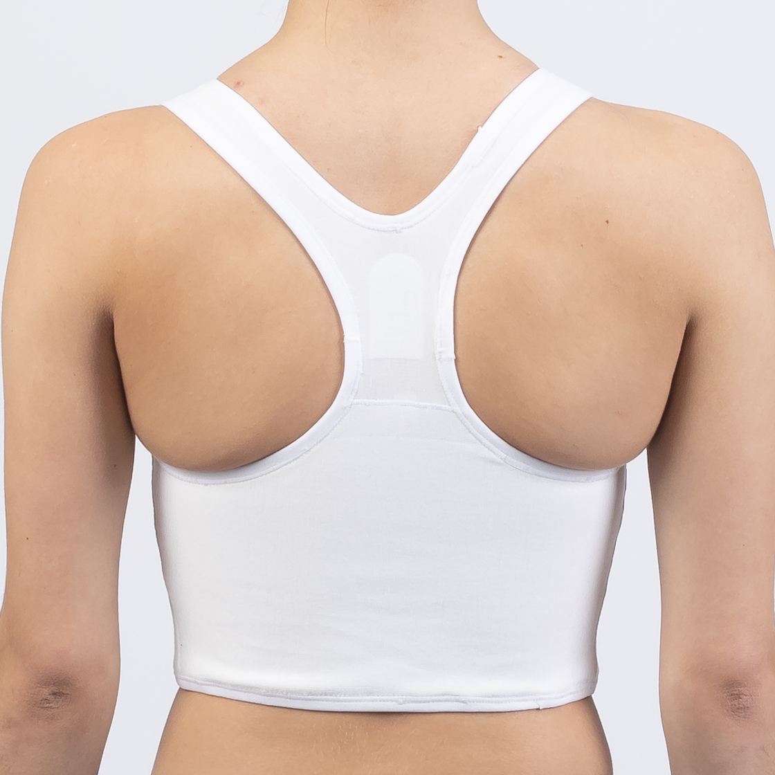 Chest compression – compresión torácica, Breast binding – compresión mamaria, Chest binding – compresión del pecho, Chest bandaging – vendaje del pecho, Breast reduction – reducción mamaria, Chest binding – compresión del pecho, Breast binding – compresión mamaria, Chest compression – compresión torácica, Breast flattening – aplanamiento del pecho, Chest bandaging – vendaje del pecho, Chest binder – binder de pecho, Trans binder – binder trans, FTM binder – binder FtM, Compression top – top de compresión, Chest binder – binder de pecho, Chest compressor – compresor de pecho, Binder trans – binder trans, Binder bra – sujetador compresor, Chest binder FTM – binder FtM, Compression top transgender binder – top compresor para personas transgénero