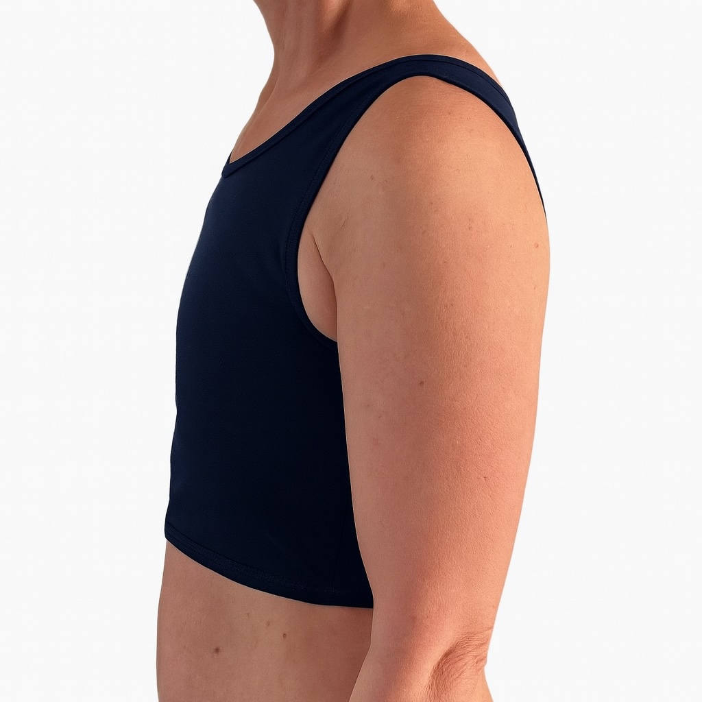 Chest compression – compresión torácica, Breast binding – compresión mamaria, Chest binding – compresión del pecho, Chest bandaging – vendaje del pecho, Breast reduction – reducción mamaria, Chest binding – compresión del pecho, Breast binding – compresión mamaria, Chest compression – compresión torácica, Breast flattening – aplanamiento del pecho, Chest bandaging – vendaje del pecho, Chest binder – binder de pecho, Trans binder – binder trans, FTM binder – binder FtM, Compression top – top de compresión, Chest binder – binder de pecho, Chest compressor – compresor de pecho, Binder trans – binder trans, Binder bra – sujetador compresor, Chest binder FTM – binder FtM, Compression top transgender binder – top compresor para personas transgénero
