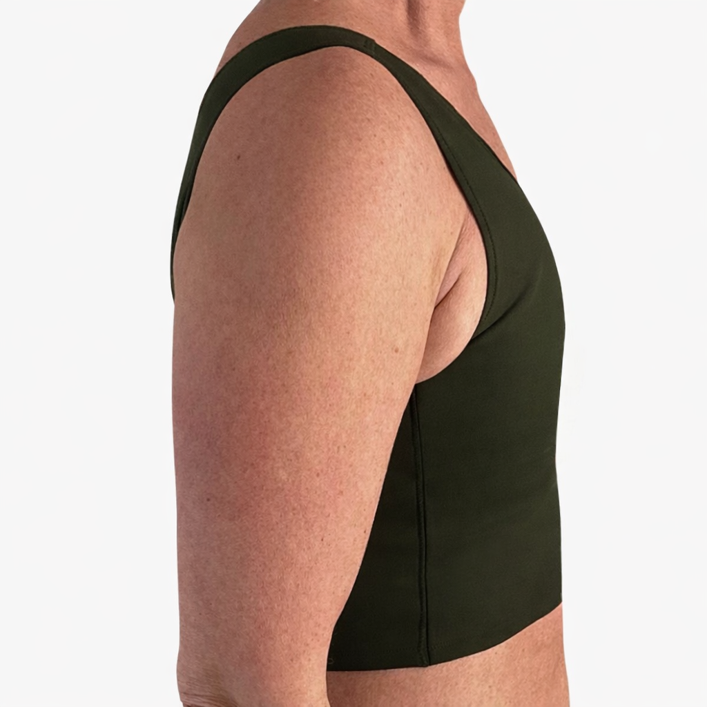 Chest compression – compresión torácica, Breast binding – compresión mamaria, Chest binding – compresión del pecho, Chest bandaging – vendaje del pecho, Breast reduction – reducción mamaria, Chest binding – compresión del pecho, Breast binding – compresión mamaria, Chest compression – compresión torácica, Breast flattening – aplanamiento del pecho, Chest bandaging – vendaje del pecho, Chest binder – binder de pecho, Trans binder – binder trans, FTM binder – binder FtM, Compression top – top de compresión, Chest binder – binder de pecho, Chest compressor – compresor de pecho, Binder trans – binder trans, Binder bra – sujetador compresor, Chest binder FTM – binder FtM, Compression top transgender binder – top compresor para personas transgénero